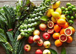 a group of fruits and vegetables on a wood surface Healthy Weight Loss Diets Bushey
